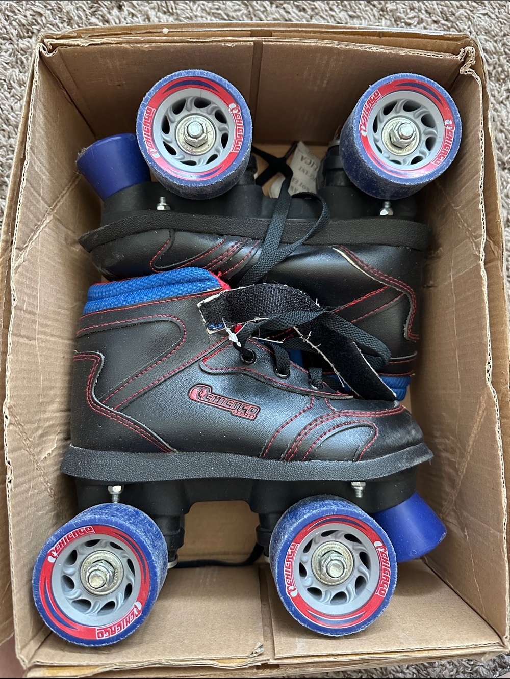 Kids Black and Blue Quad Roller Skates with Red Stitching